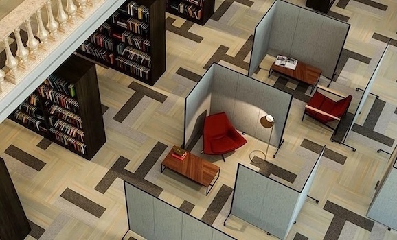 Library Workspace Privacy Portable room dividers arranged around chairs and desks to create private library workspaces.