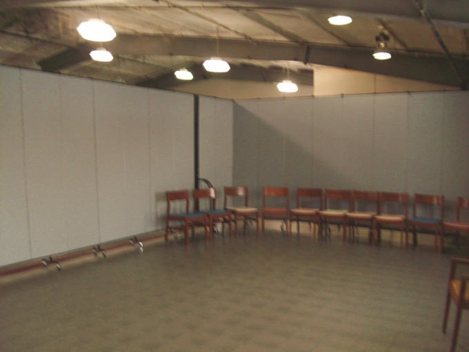 Two Room Divider set up in a square for children's activities A look inside the portable room made inside a multi-purpose room with folding walls