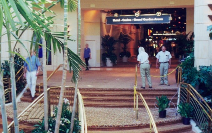 Busy stairwell prior to workers rolling a Screenflex Divider into place to restrict convention center access