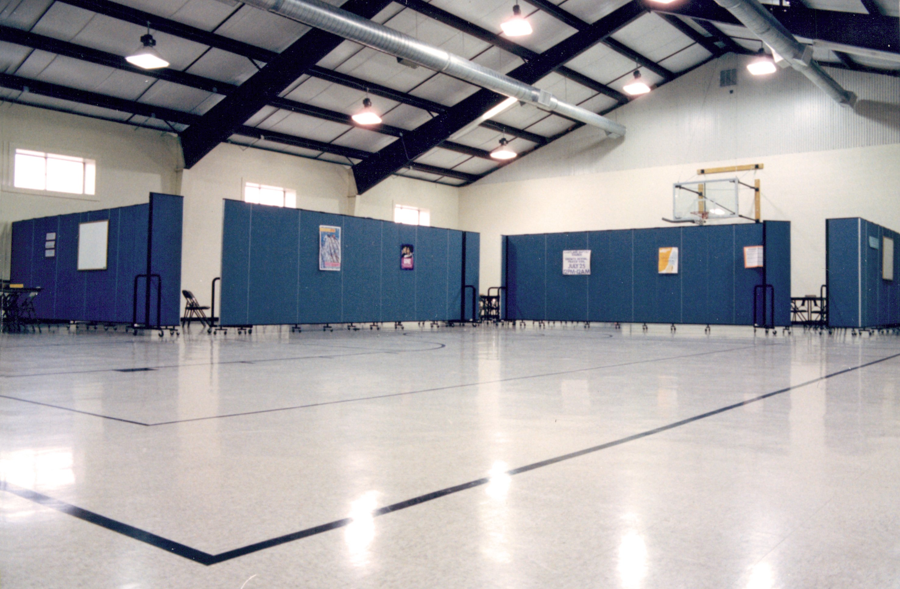 Even this cavernous gym can be easily subdivided for class or other use with acoustical portable walls