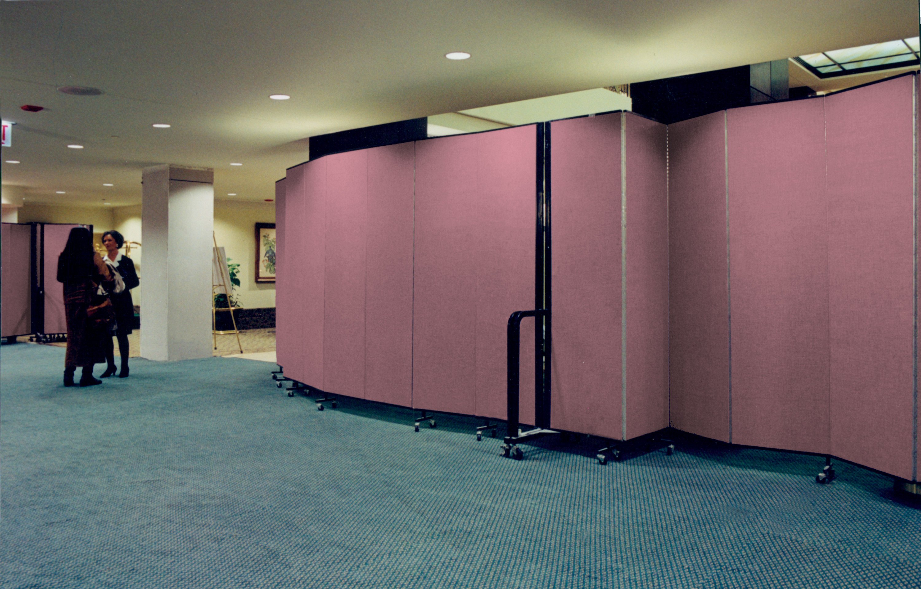 Room dividers hide hotel construction in a lobby from guests