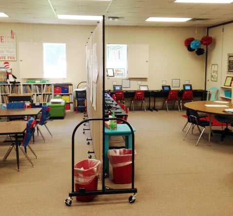 A school uses a classroom partition to divide a classroom into two rooms