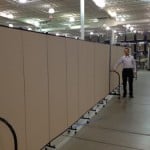 2 9 panel room dividers connected to create a long continuous wall