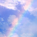 A striking rainbow against a cloudy sky