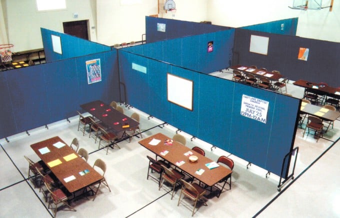 Screenflex Room Dividers are arranged to create 6 rooms in a gymnasium