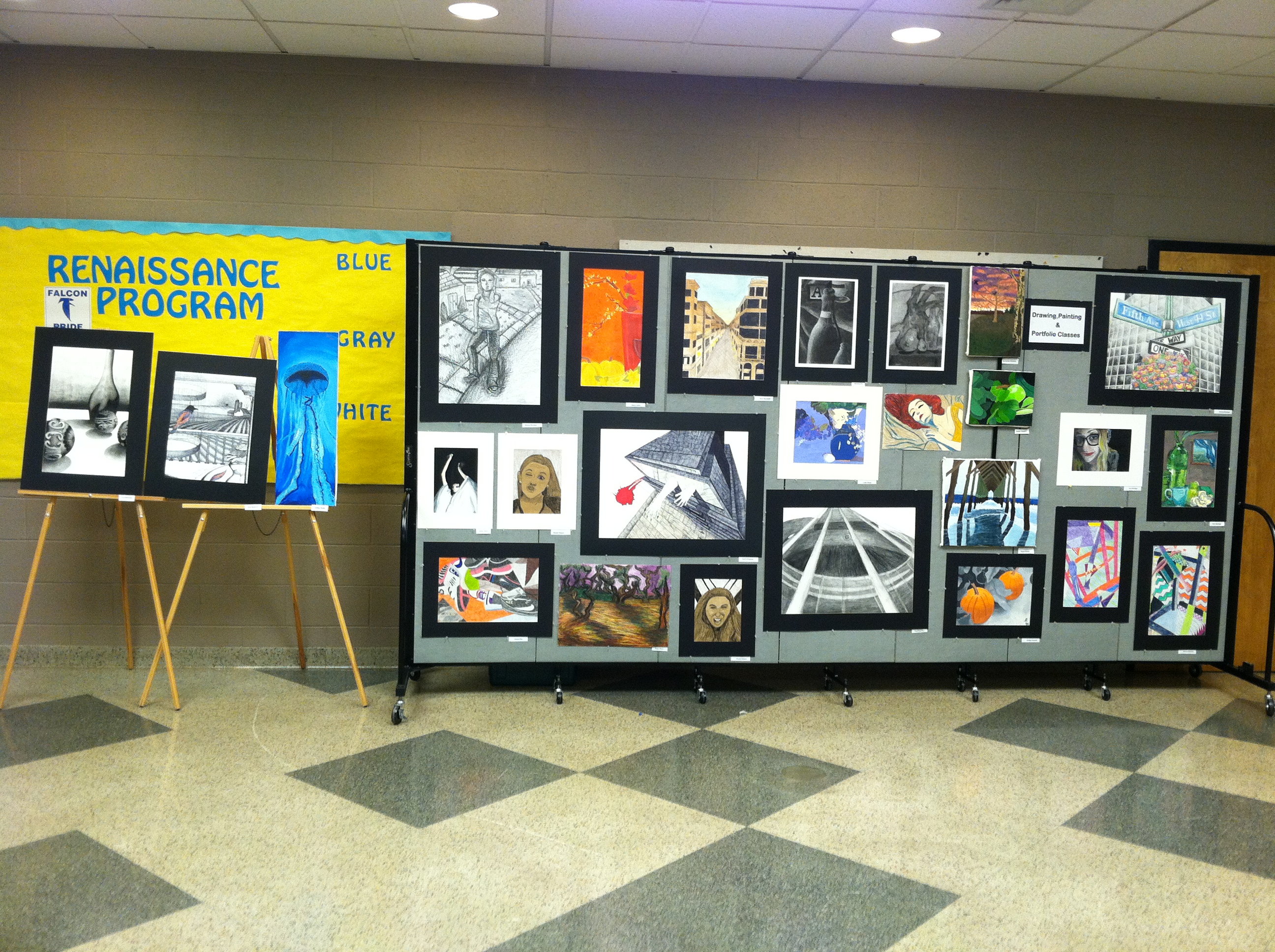 Renaissance program art display board in a hallway