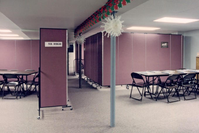 Room Dividers create individual meeting rooms for a church sr high youth group in the church basement