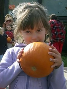 girls with pumpkin