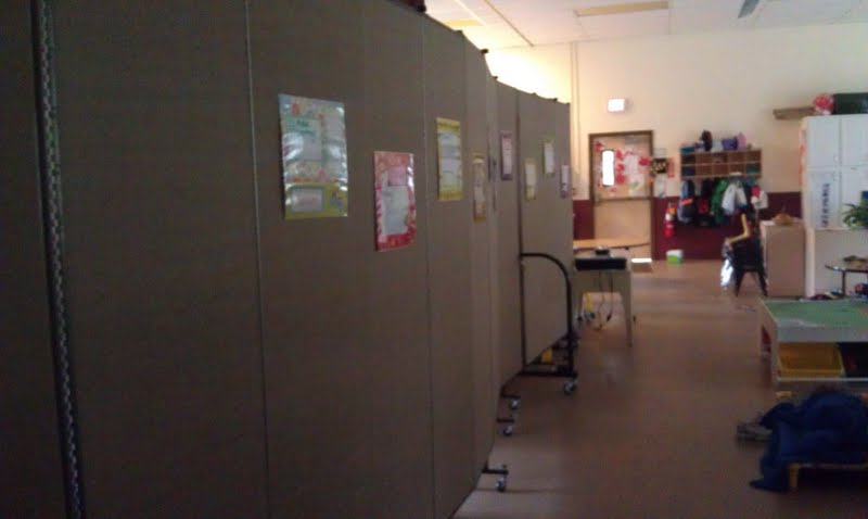 Two Screenflex Room Dividers are connected to form a dividing wall in a preschool