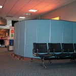 Screenflex Room Dividers create barrier walls in an airport.