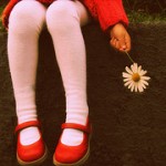 girl holding flower