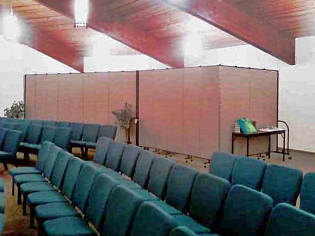 This church uses decorative room separators to make a narthex 
