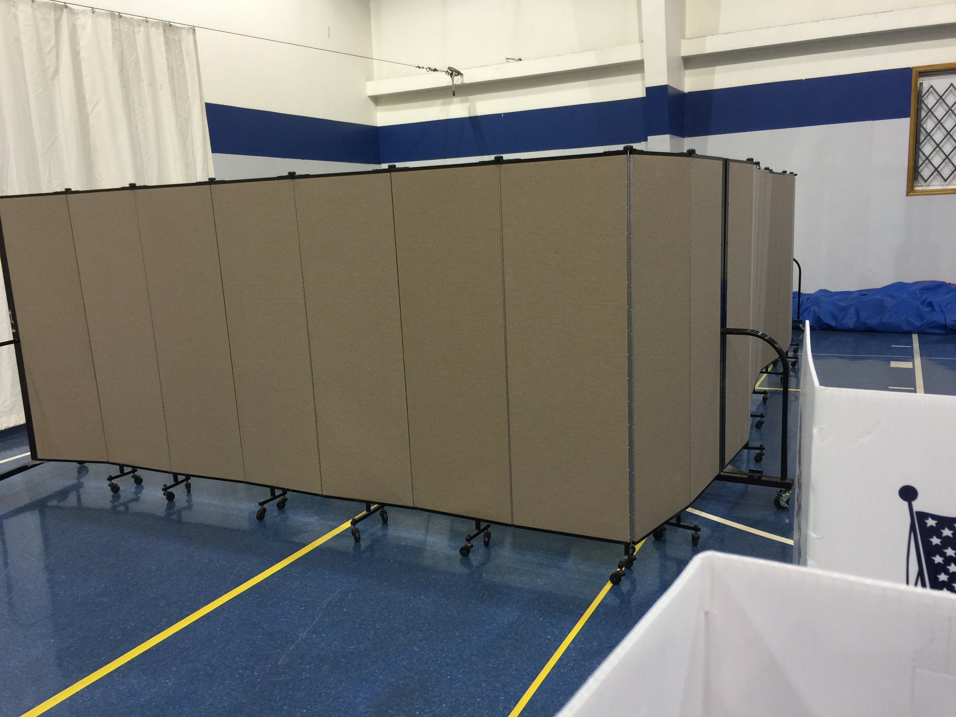 Private area for polling place workers and equipment.