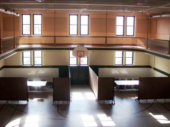 Room dividers creating classrooms in a school gym