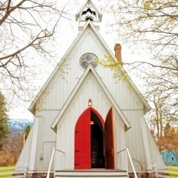 Country church with open red doors