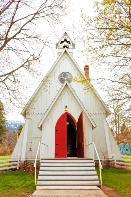 Country church with open red doors