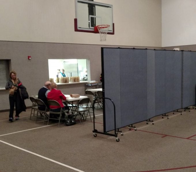 Room Dividers roll into place to separate a multipurpose room