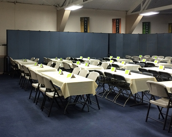 Banquet privacy screens divide a large hall into smaller space