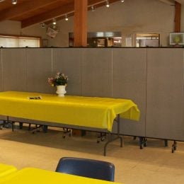Folding partitions section of a portion of a banquet hall