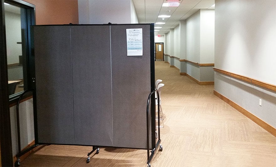 Privacy wall in a hallway for tax preparation