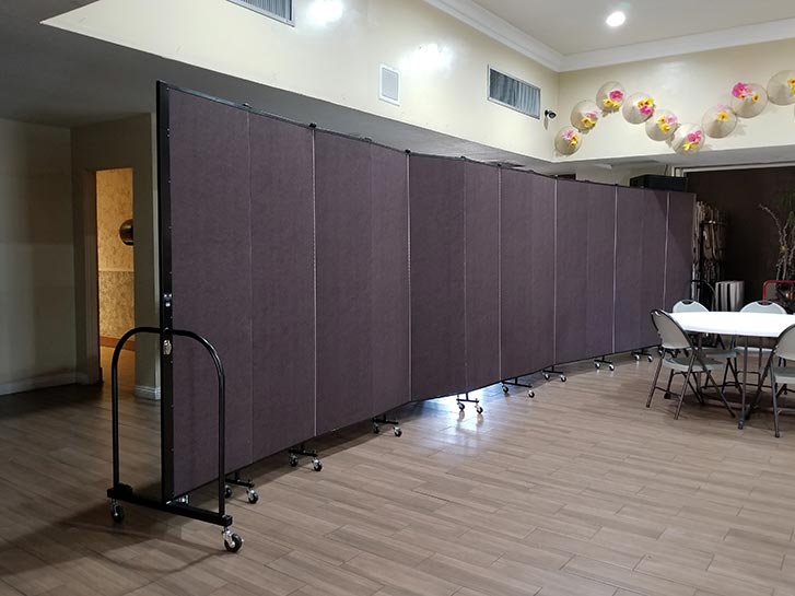 Room divider creates a hallway in a fellowship hall