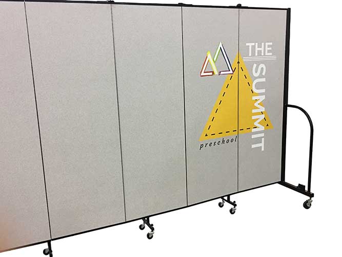 Grey room divider featuring The summit preschool logo