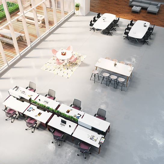 Open space meeting area with tables and chairs