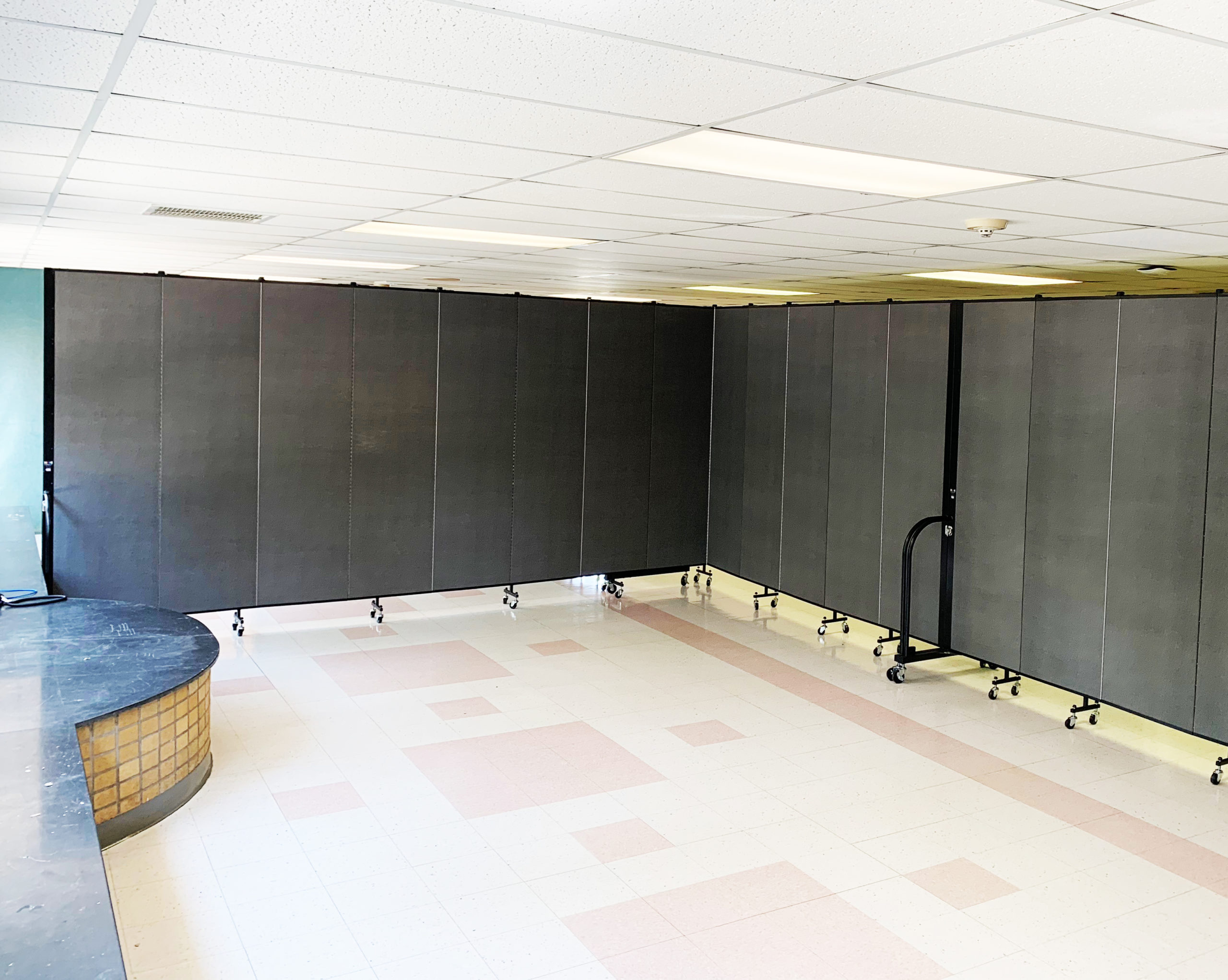 gray room divider in hallway