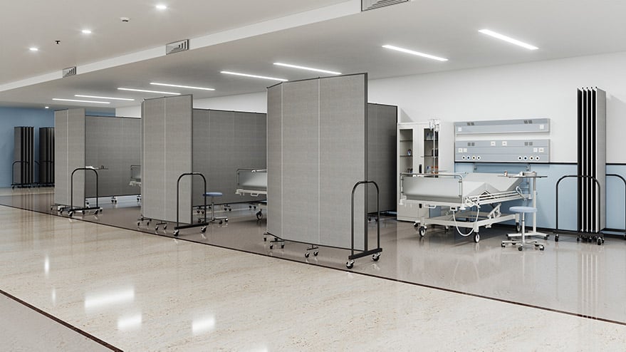 medical dividers surrounding hospital bed