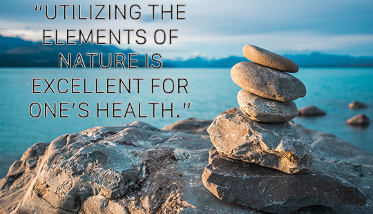 optimal healing environments-rocks stacked on a waterfront