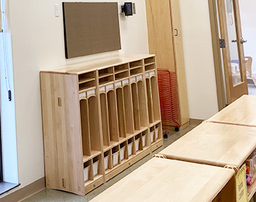 Individual Storage Areas several cubbies lined up in a day care.