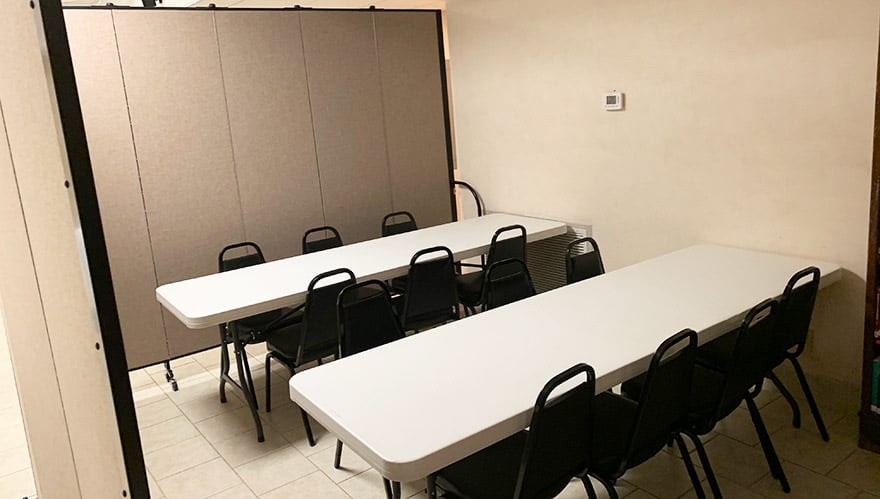 church partition surrounding a table