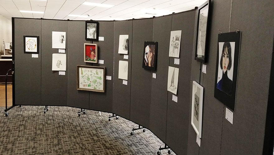 art displayed on freestanding walls