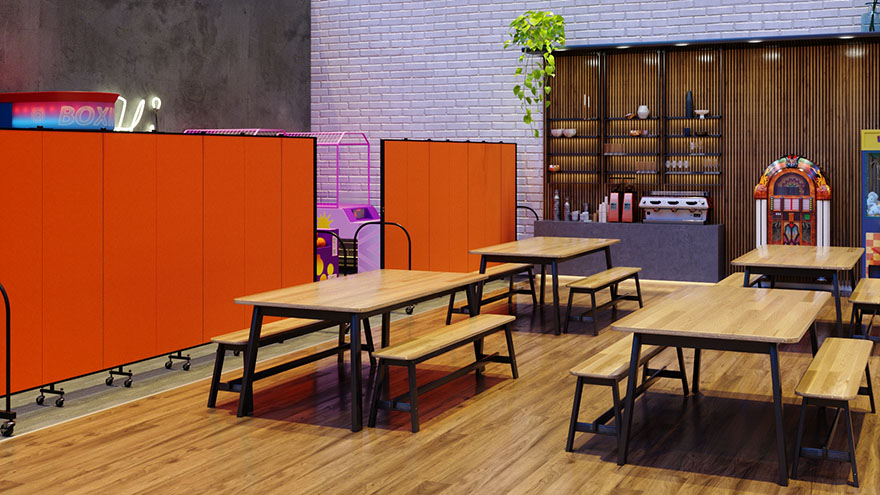 Orange room dividers separate arcade from seating area
