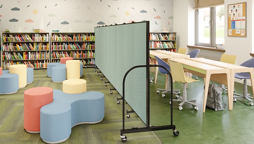 library childrens space with green dividers separating the desk area
