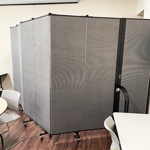 Grey partitions fashioned in a portable room