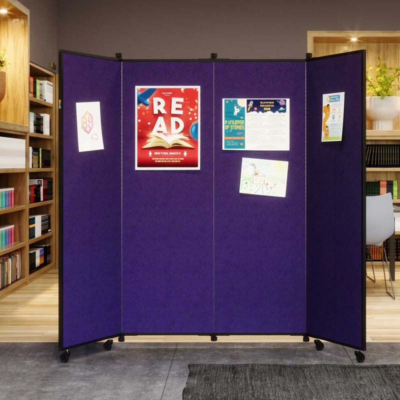Purple Display tower with posters on it in a library