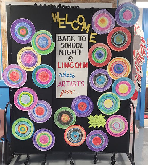 Welcome back to school display with artwork on it