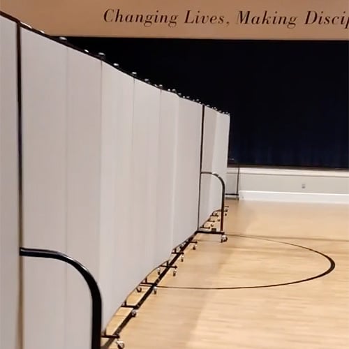 Gray room dividers in a gym