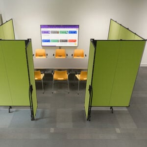 Green room dividers surrounding a meeting