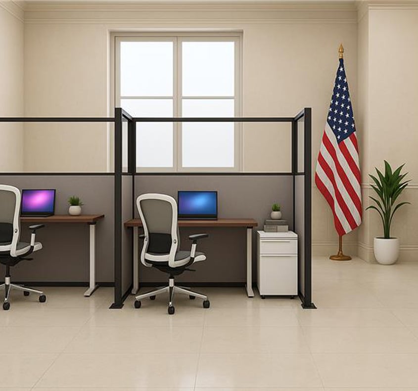Cubicles in government office with an American flag the room.