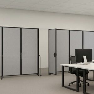 Two Gray Straightflex Room Divider in office space with swing door attached to one divider.